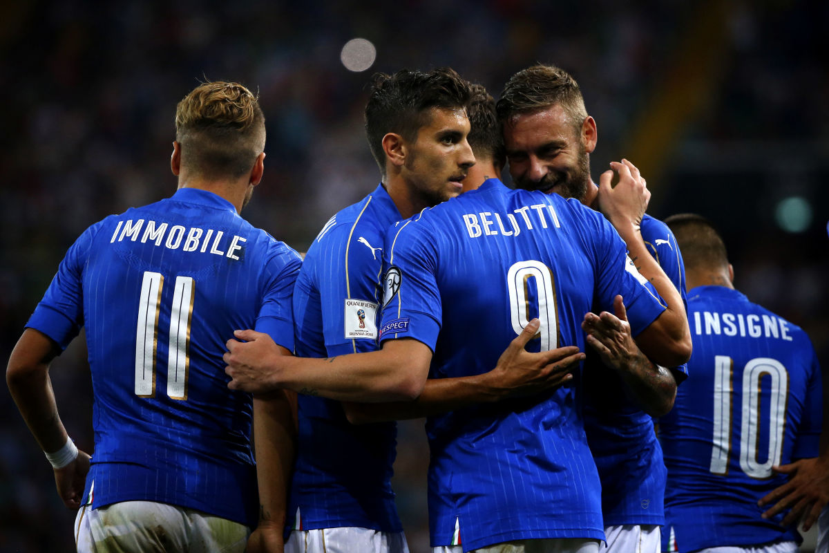 Italy's forward Andrea Belotti (3rd-L) celebrates after scoring with his teammates during the FIFA World Cup 2018 qualification football match between Italy and Liechtenstein at the Dacia Arena Stadium in Udine, on June 11, 2017. / AFP PHOTO / Marco BERTORELLO        (Photo credit should read MARCO BERTORELLO/AFP/Getty Images)