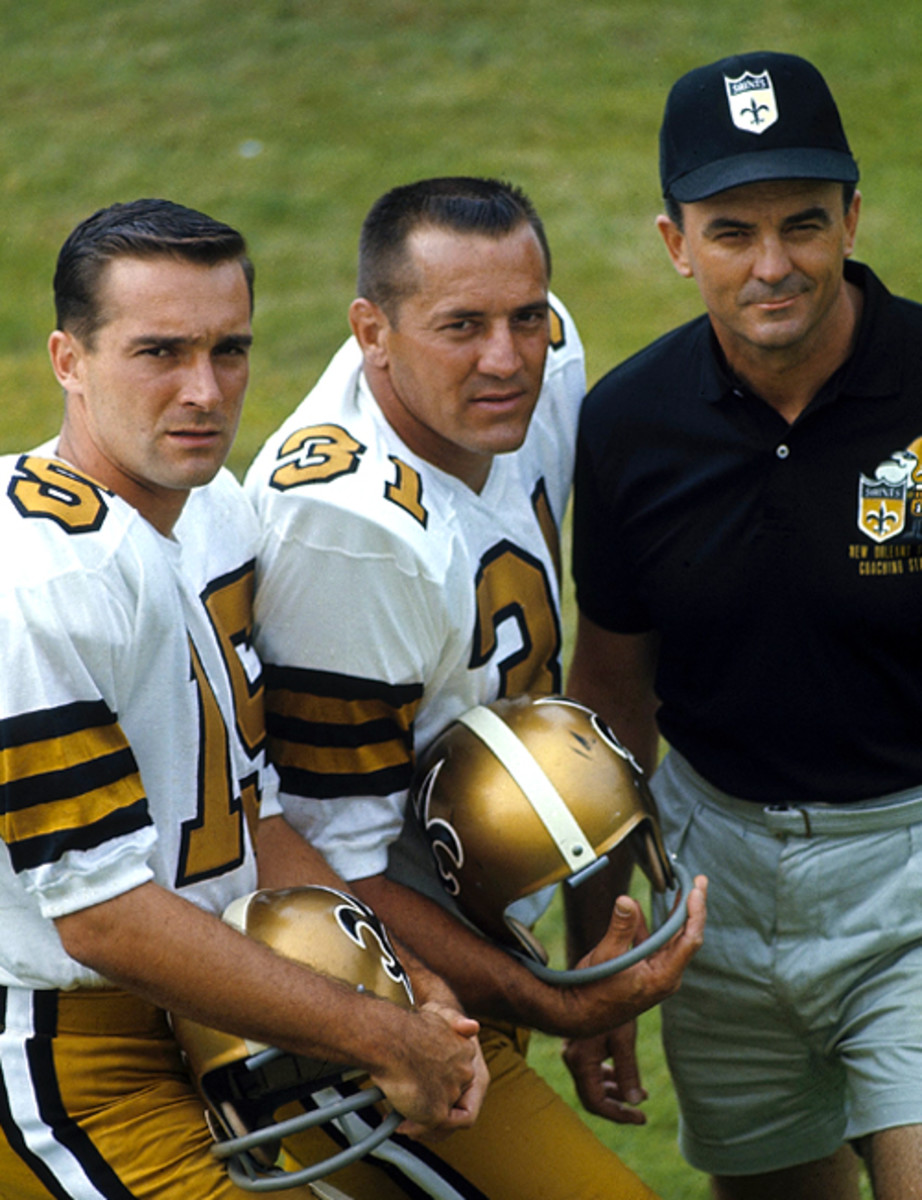 QB Gary Cuozzo, running back Jim Taylor and coach Tom Fears during training camp.