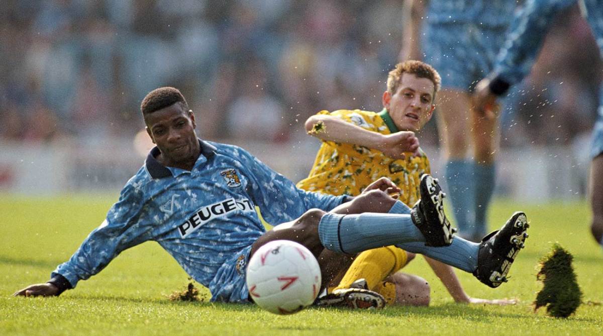 Coventry player Lloyd McGrath is challenged by Ian Crook of Norwich at Highfield Road on September 29, 1992.