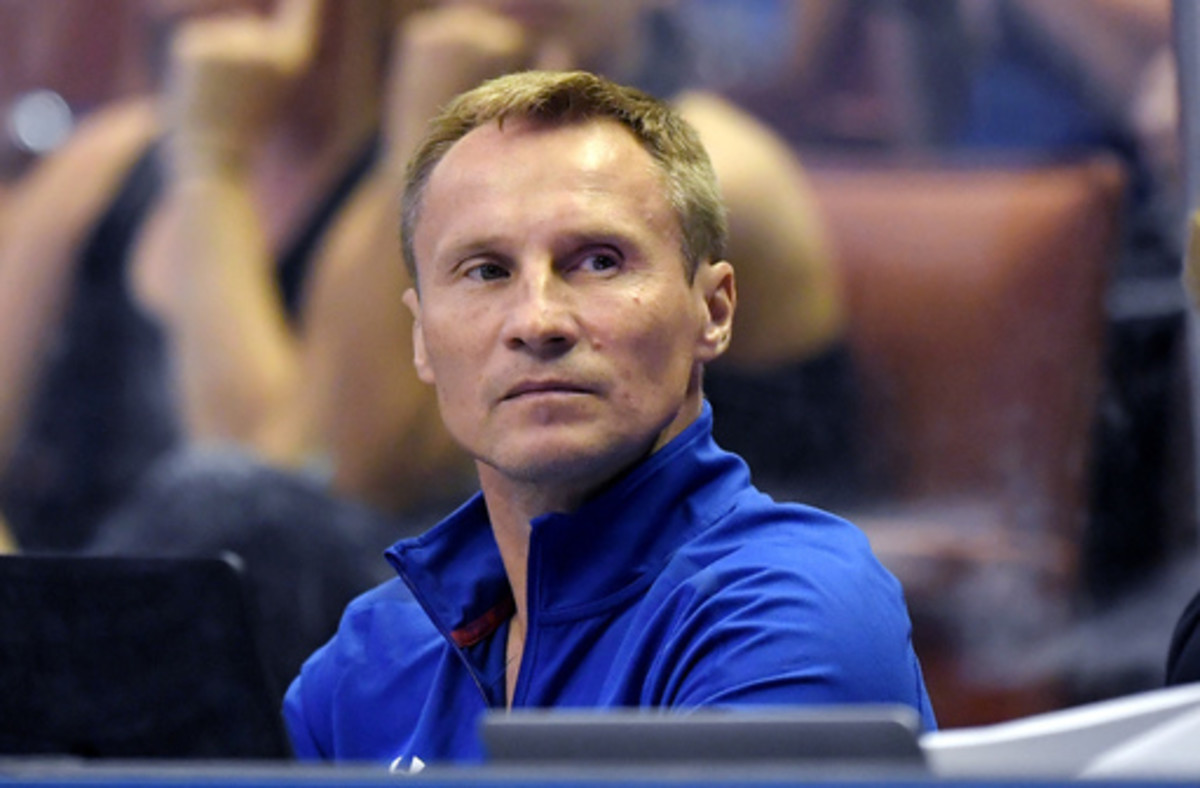 Valeri Liukin watches during women's Round 1 of the USA Gymnastics championships, Friday, Aug. 18, 2017, in Anaheim, Calif. Liukin insists the expectations for the U.S. women's gymnastics program have not changed now that he's taken over for the retired M