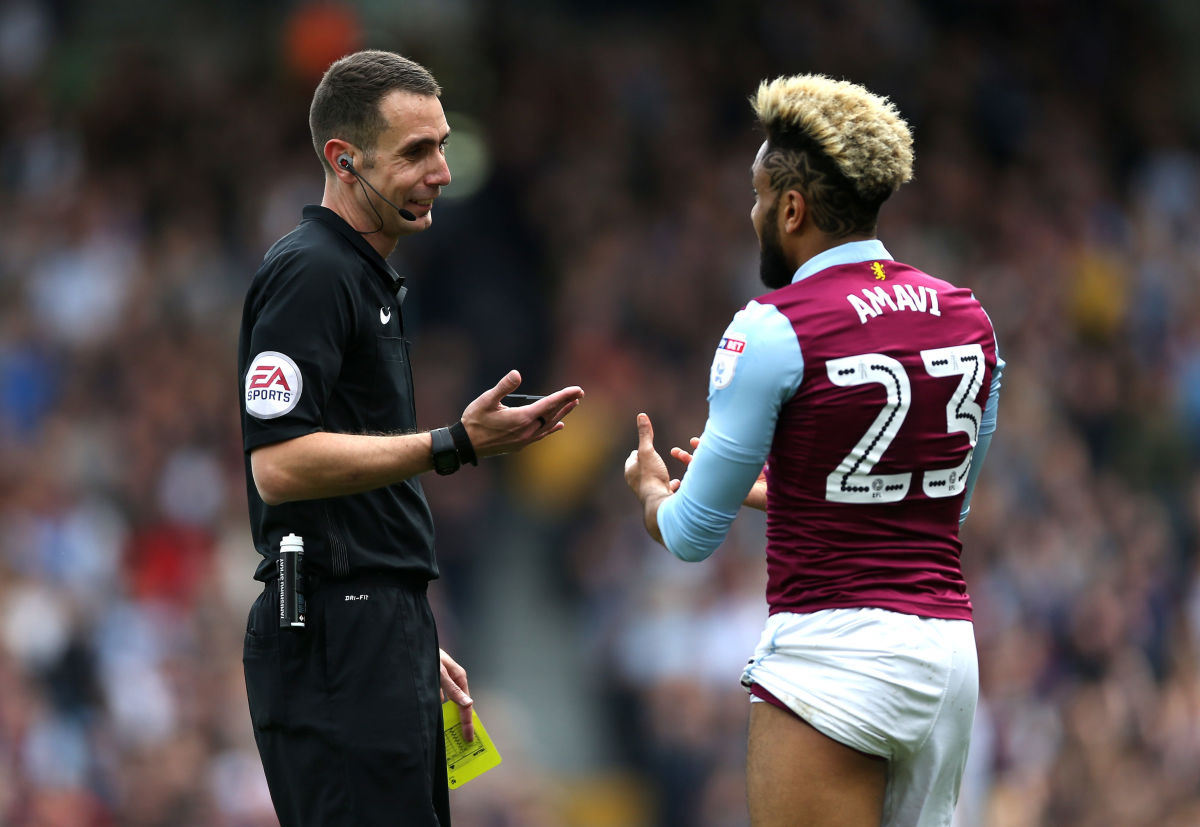 LONDON, ENGLAND - APRIL 17:  Jordan Amavi of Aston Villa is shown a yellow card during the Sky Bet Championship match between Fulham and Aston Villa at Craven Cottage on April 17, 2017 in London, England.  (Photo by Alex Pantling/Getty Images)
