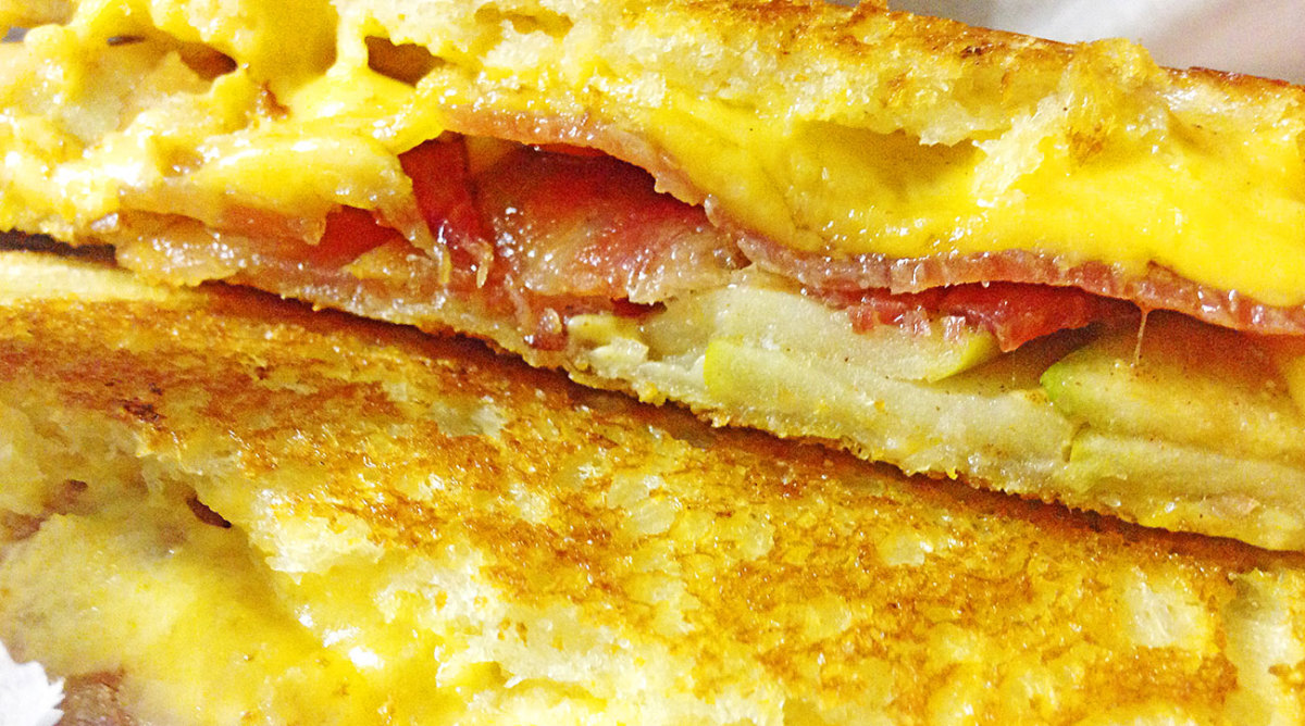 Grabbing a late-night grilled cheese from the Miss Cheezious food truck. 