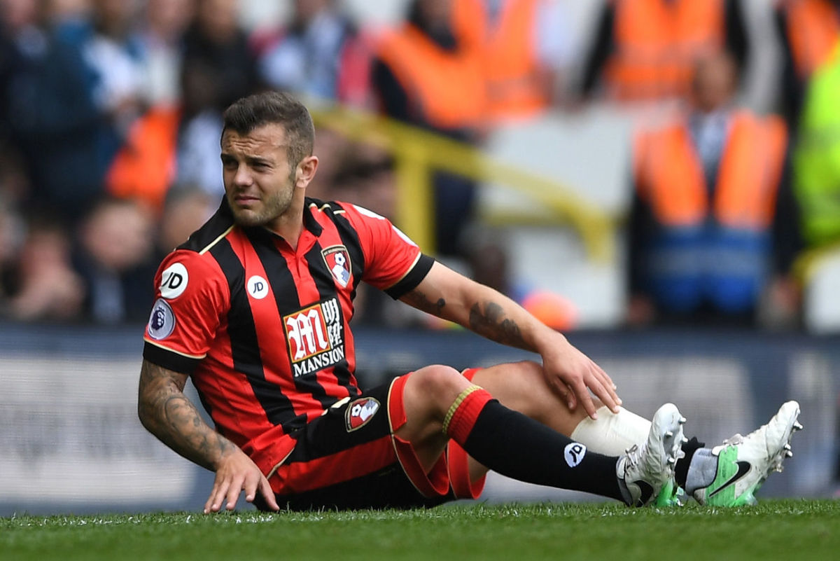 LONDON, ENGLAND - APRIL 15: Jack Wilshere of AFC Bournemouth goes down injured during the Premier League match between Tottenham Hotspur and AFC Bournemouth at White Hart Lane on April 15, 2017 in London, England.  (Photo by Shaun Botterill/Getty Images)