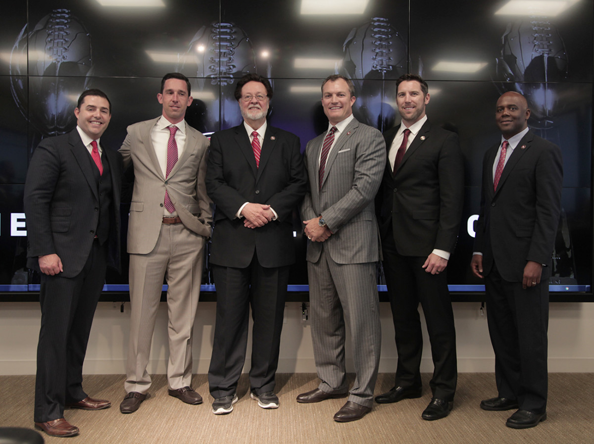 Left to right: Jed York, Shanahan, John York, Lynch, Peters and Mayhew