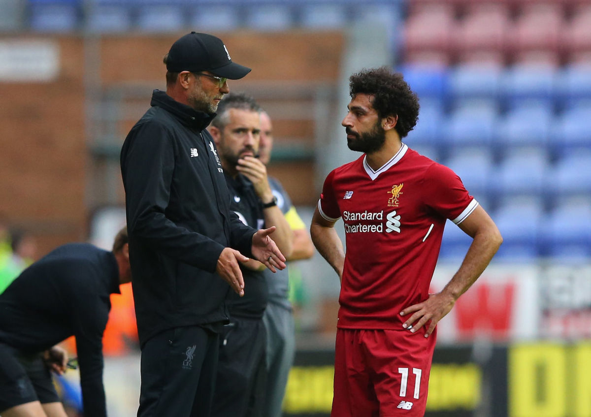 WIGAN, ENGLAND - JULY 14:  Jurgen Klopp the manager of Liverpool talks with Mohamed Salah of Liverpool during the pre-season friendly match between Wigan Athletic and Liverpool at DW Stadium on July 14, 2017 in Wigan, England.  (Photo by Alex Livesey/Getty Images)