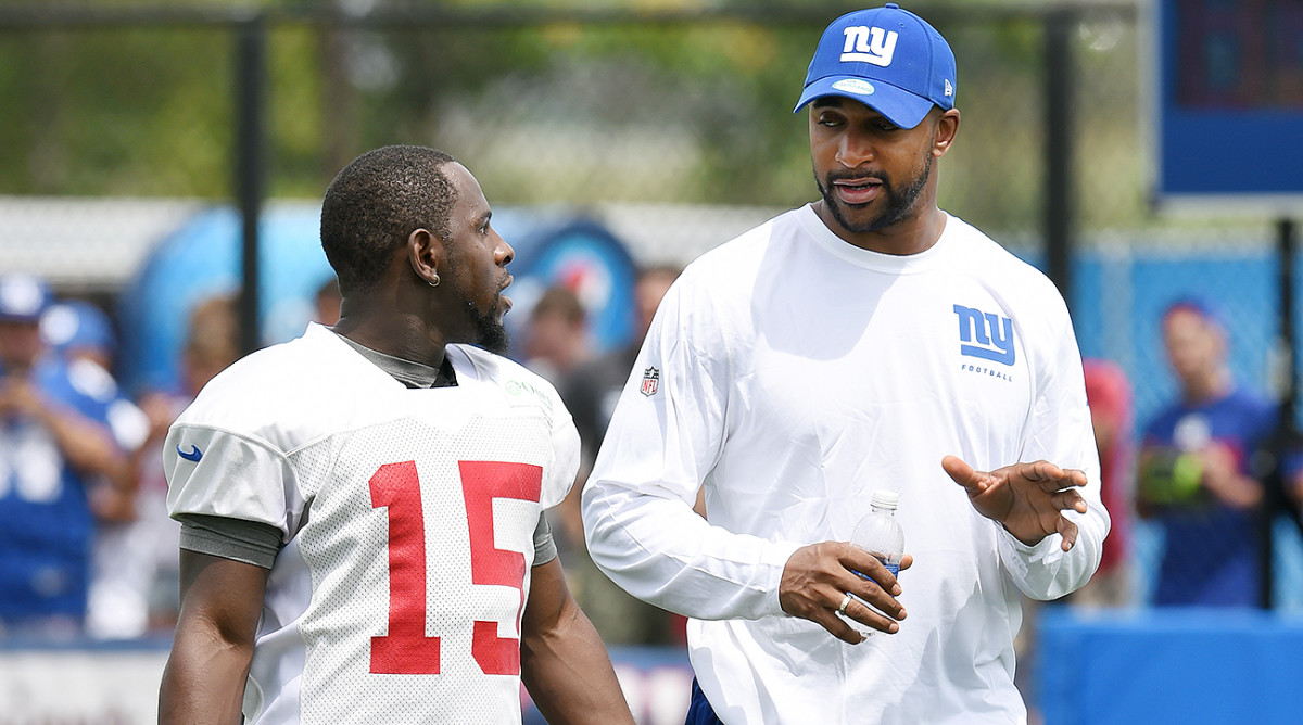 Since rejoining the Giants in 2014, Tyree (right) has become the mentor he needed often in his playing days.