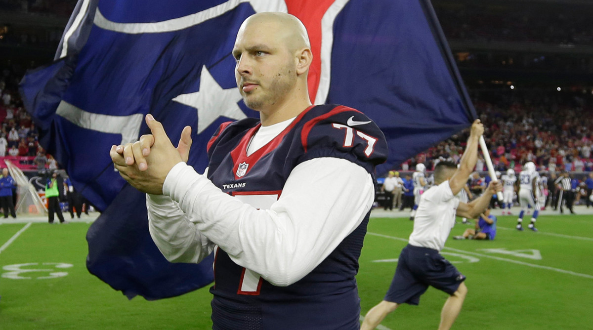 David Quessenberry, here in 2014 serving as a Texans honorary captain, returned to the field last week after a three-year battle with lymphoma.
