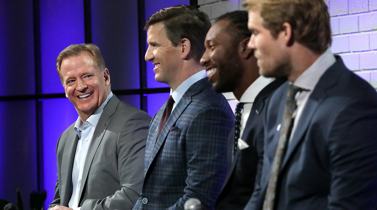 Roger Goodell hosted a fan forum in February with Walter Payton Man of the Year finalists (from left to right) Eli Manning, Larry Fitzgerald and Greg Olsen.