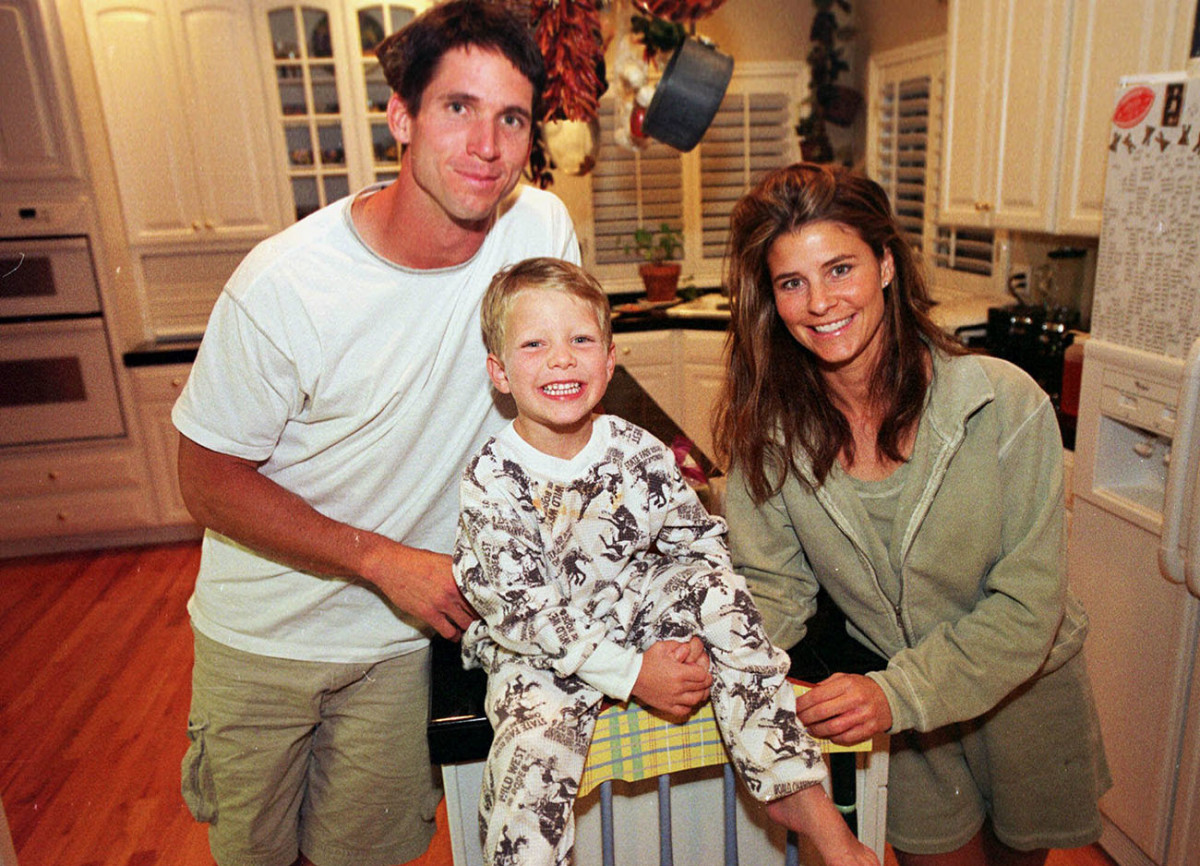A 5-year-old Christian with mom and dad in 2000.
