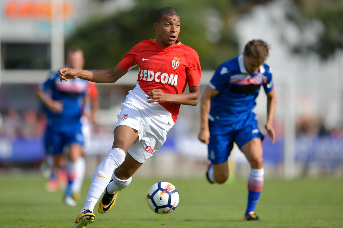 Monaco's forward Kylian Mbappe controls the balll during a friendly football match between AS Monaco and Stoke City FC in Martigny on July 15, 2017. / AFP PHOTO / Fabrice COFFRINI        (Photo credit should read FABRICE COFFRINI/AFP/Getty Images)