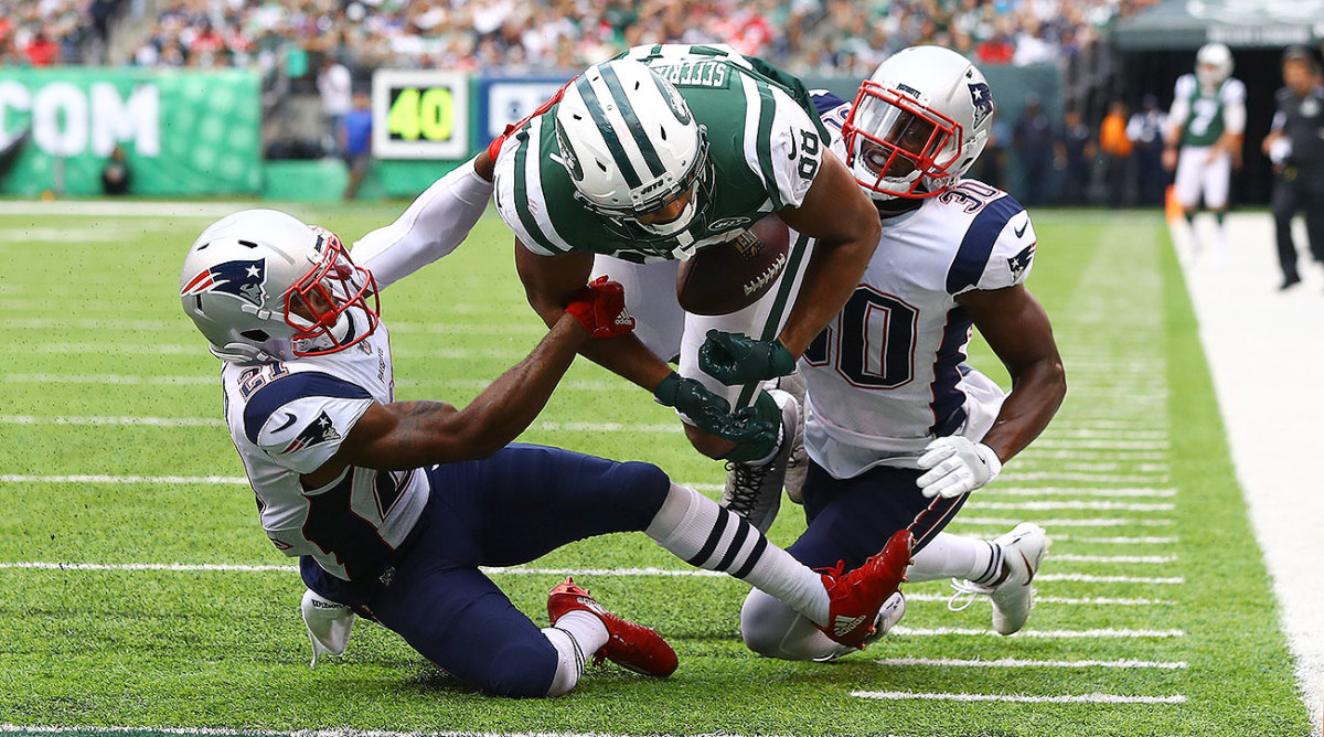 Buoyed by Controversial Call, Patriots Hold Off Jets.