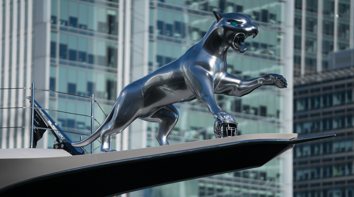 A gleaming jaguar graces the prow of Khan’s $200 million ship.