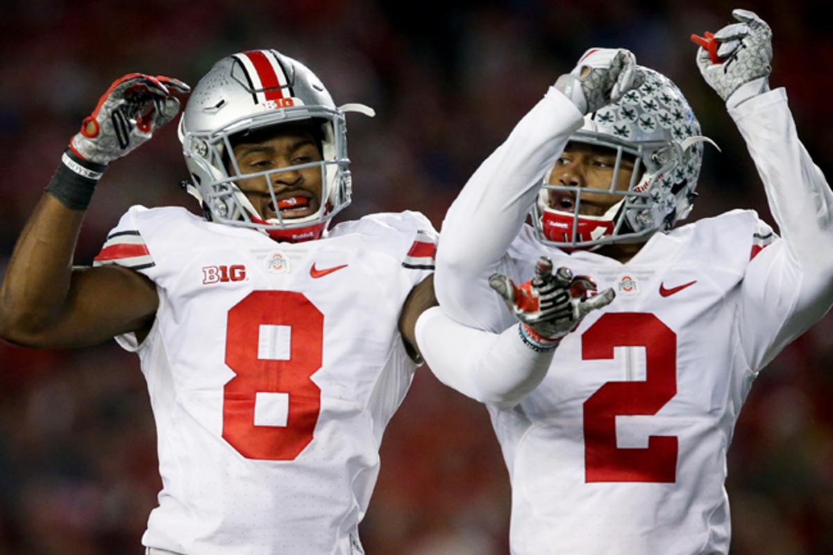 Ohio State’s Gareon Conley (No. 8) and Marshon Lattimore celebrate Conley’s interception at Wisconsin last season. 