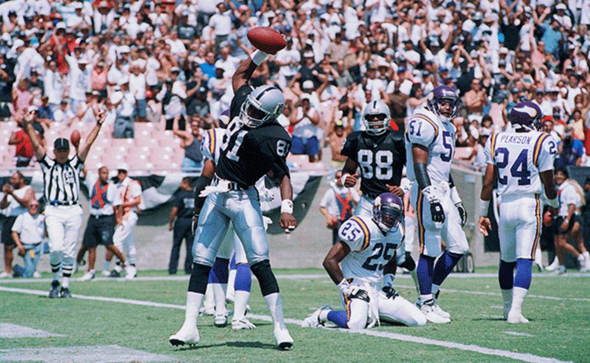 Brown spikes the ball after scoring at the L.A. Coliseum in 1993.