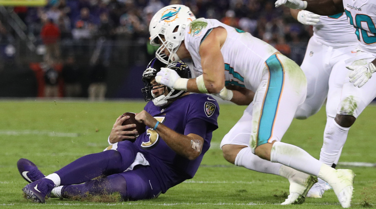 Dolphins linebacker Kiko Alonso was penalized for unnecessary roughness but not kicked out of the game for this hit on Ravens quarterback Joe Flacco.
