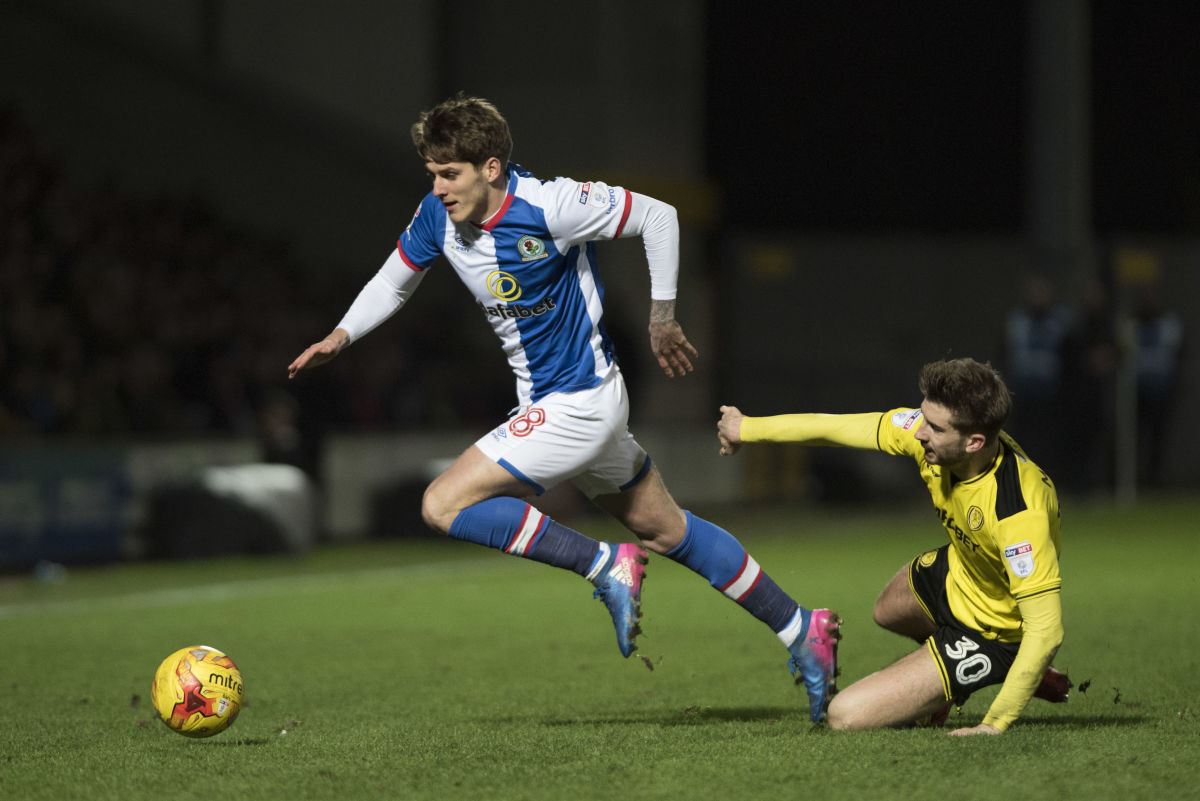 BURTON-UPON-TRENT, ENGLAND-FEBRUARY 24: Connor Mahoney of Blackburn Rovers and Luke Murphy of Burton Albion in action during the Sky Bet Championship match between Burton Albion and Blackburn Rovers at Pirelli Stadium on February 24, 2017 in Burton-upon-Trent, England (Photo by Nathan Stirk/Getty Images).