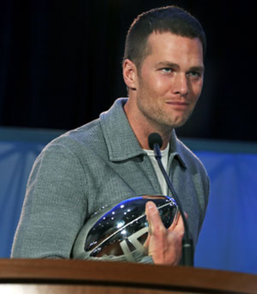 Tom Brady tucks away his Super Bowl MVP trophy on Monday morning.