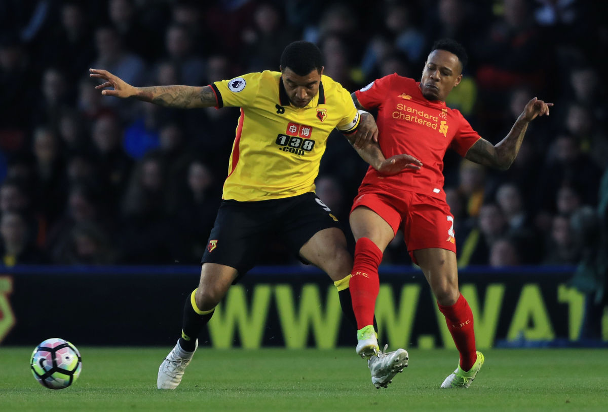 WATFORD, ENGLAND - MAY 01:  Troy Deeney of Watford is challenged by Nathaniel Clyne of Liverpool during the Premier League match between Watford and Liverpool at Vicarage Road on May 1, 2017 in Watford, England.  (Photo by Richard Heathcote/Getty Images)