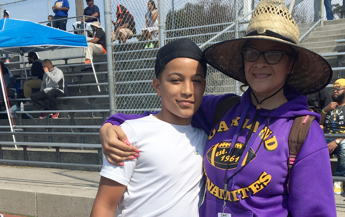 Rafael Campbell Jr. and his mom, Tanisha Kamenis, at the Oakland Dynamites games on Saturday morning.  