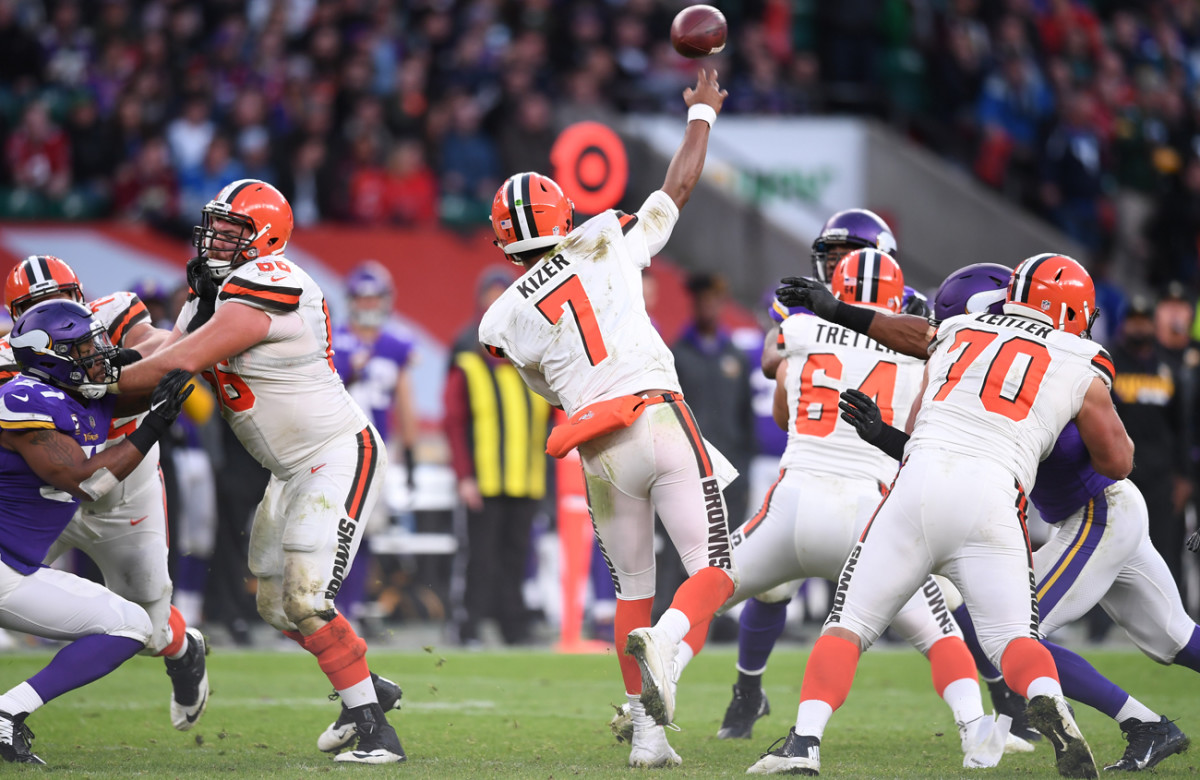 Spencer Drango (No. 66, left) stepped in at left tackle and helped keep a relatively clean pocket for quarterback DeShone Kizer.