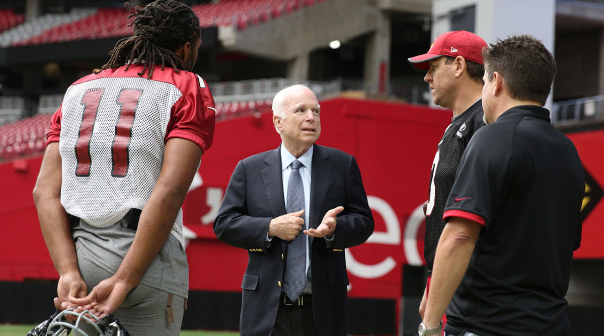 John McCain with Larry Fitzgerald and Carson Palmer.  