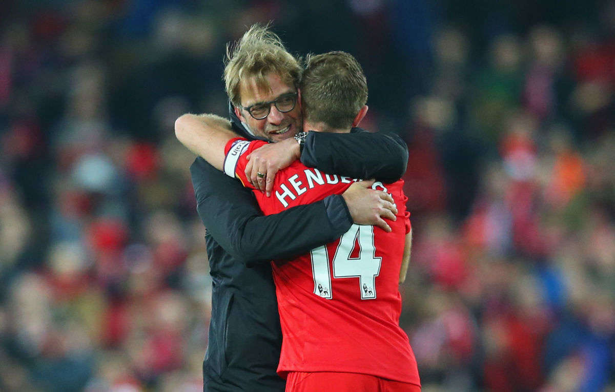 LIVERPOOL, ENGLAND - DECEMBER 27:  Jurgen Klopp manager of Liverpool embraces Jordan Henderson of Liverpool after the Premier League match between Liverpool and Stoke City at Anfield on December 27, 2016 in Liverpool, England.  (Photo by Alex Livesey/Getty Images)