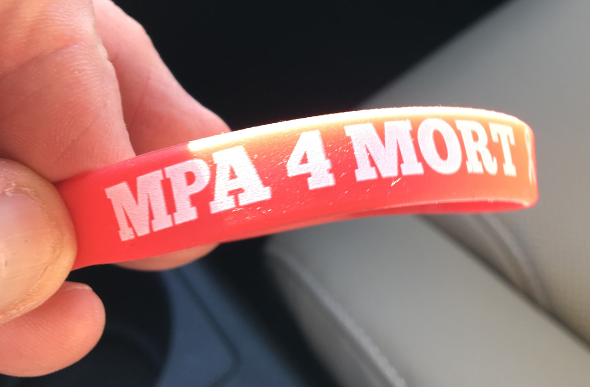 Mortensen was a fixture at the Manning Passing Academy. When he couldn’t make it in 2016, Archie had supportive wristbands distributed to all the campers.