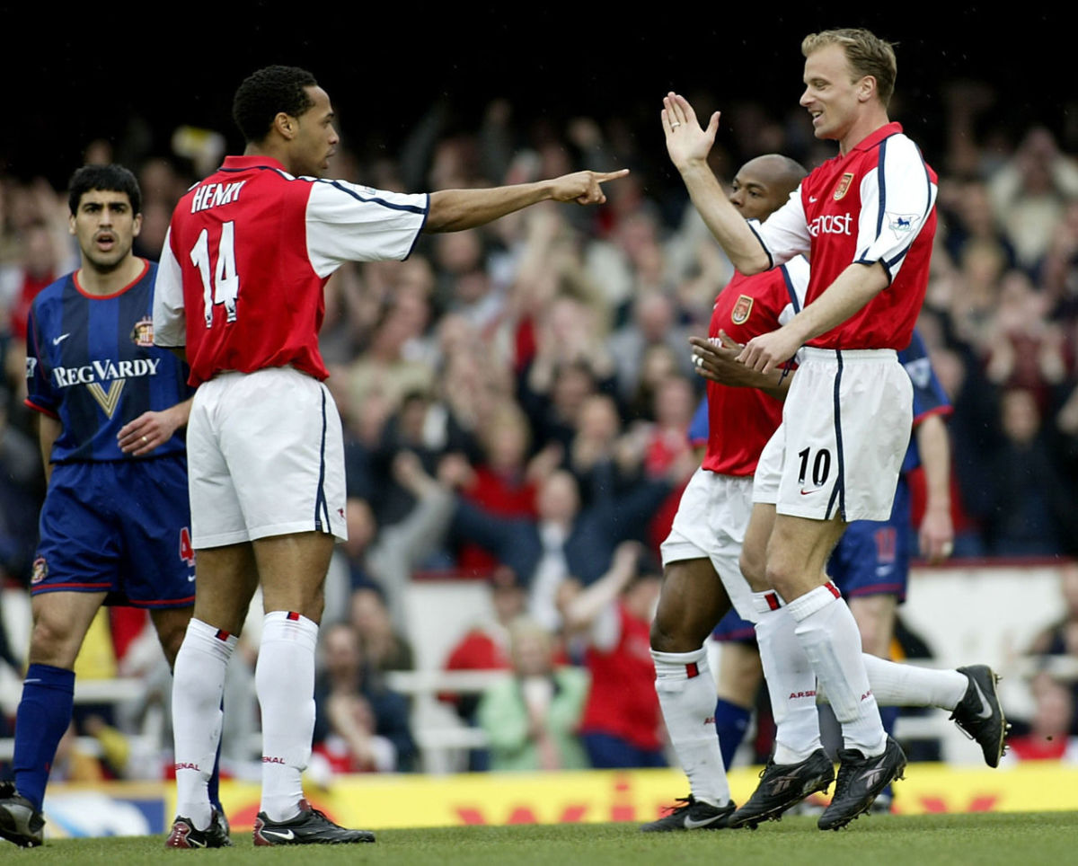 30 Mar 2002:  Dennis Bergkamp of Arsenal celebrates his goal with Thierry Henry during the FA Barclaycard Premiership match between Arsenal and Sunderland at Highbury, London.  DIGITAL IMAGE  Mandatory Credit: Shaun Botterill/Getty Images