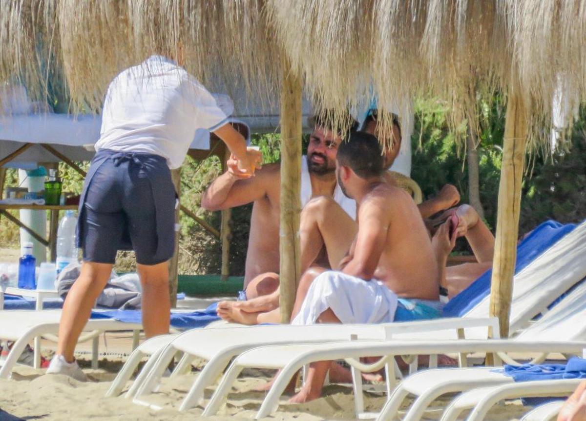  Atletico Madrid striker Diego Costa orders a cold beer as he celebrates his birthday