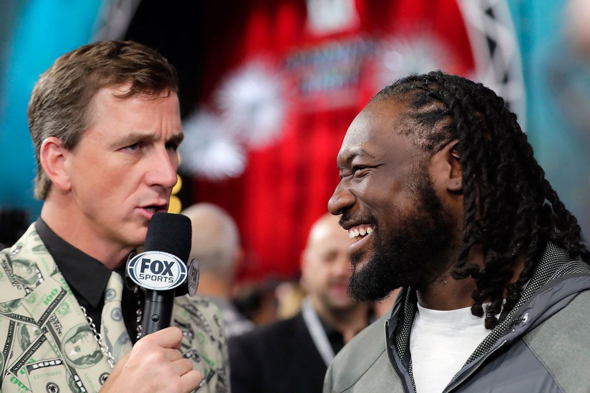 Super-Bowl-LI-Opening-Night-Cooper-Manning-LeGarrette-Blount.jpg