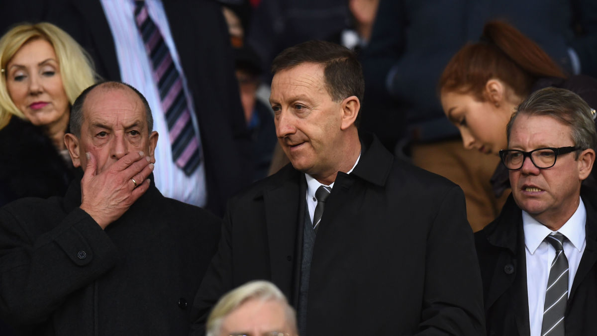 SWANSEA, WALES - DECEMBER 20:  Swansea chairman Huw Jenkins (c) looks on before during the Barclays Premier League match between Swansea City and West Ham United at the Liberty Stadium on December 20, 2015 in Swansea, Wales.  (Photo by Stu Forster/Getty Images)