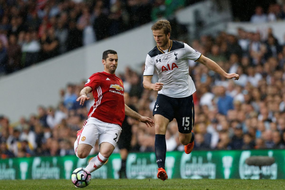 Manchester United's Armenian midfielder Henrikh Mkhitaryan (L) vies with Tottenham Hotspur's English defender Eric Dier during the English Premier League football match between Tottenham Hotspur and Manchester United at White Hart Lane in London, on May 14, 2017. / AFP PHOTO / IKIMAGES / Ian KINGTON / RESTRICTED TO EDITORIAL USE. No use with unauthorized audio, video, data, fixture lists, club/league logos or 'live' services. Online in-match use limited to 45 images, no video emulation. No use in betting, games or single club/league/player publications.        (Photo credit should read IAN KINGTON/AFP/Getty Images)