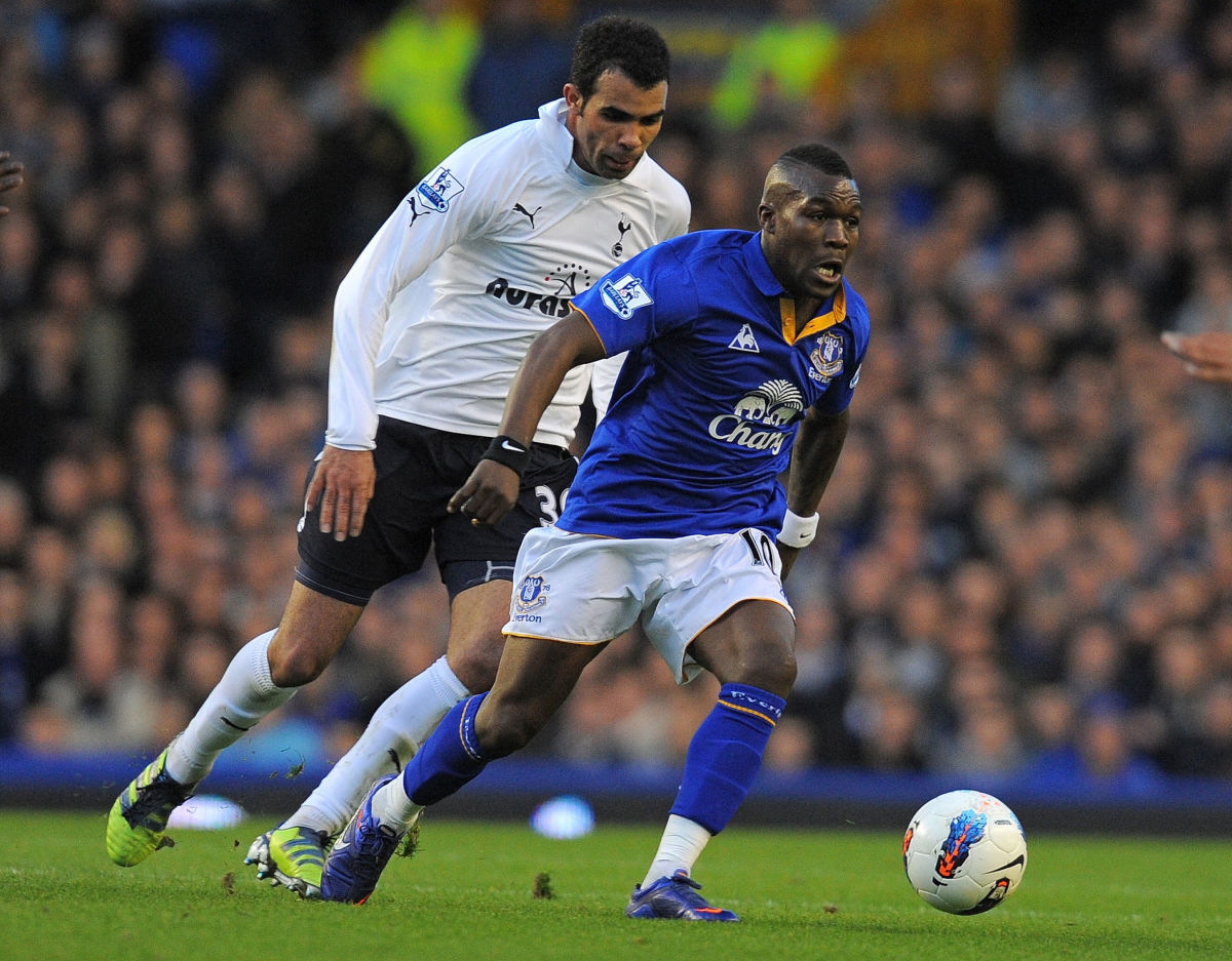Everton's Dutch midfielder Royston Drenthe (R) vies with Tottenham Hotspur's Brazilian midfielder Sandro (L) during the English Premier League football match between Everton and Tottenham Hotspur at Goodison Park in Liverpool, north-west England on March 10, 2012. AFP PHOTO/ANDREW YATES

RESTRICTED TO EDITORIAL USE. No use with unauthorized audio, video, data, fixture lists, club/league logos or “live” services. Online in-match use limited to 45 images, no video emulation. No use in betting, games or single club/league/player publications (Photo credit should read ANDREW YATES/AFP/Getty Images)