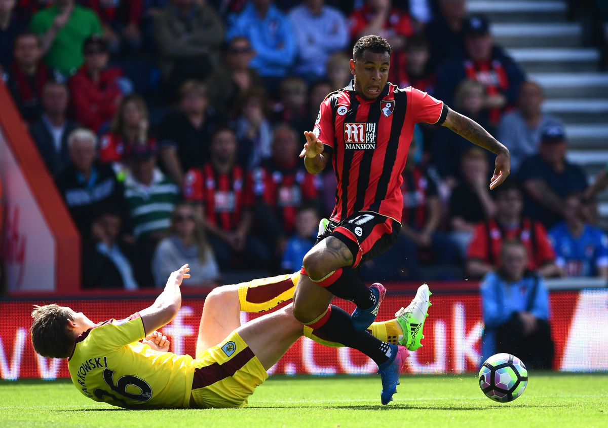 BOURNEMOUTH, ENGLAND - MAY 13: Paul Robinson of Burnley gets past James Tarkowski of Burnley during the Premier League match between AFC Bournemouth and Burnley at Vitality Stadium on May 13, 2017 in Bournemouth, England.  (Photo by Alex Broadway/Getty Images)