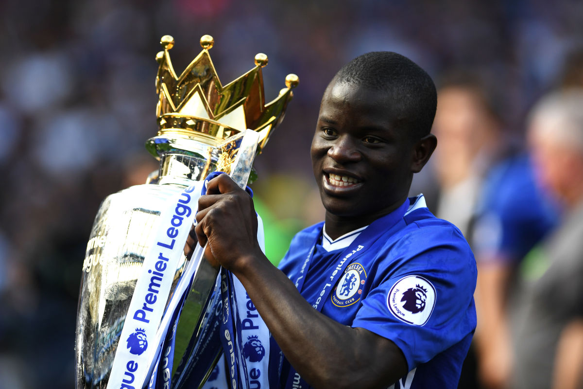 LONDON, ENGLAND - MAY 21: N'Golo Kante of Chelsea celebrates with the Premier League Trophy after the Premier League match between Chelsea and Sunderland at Stamford Bridge on May 21, 2017 in London, England.  (Photo by Shaun Botterill/Getty Images)