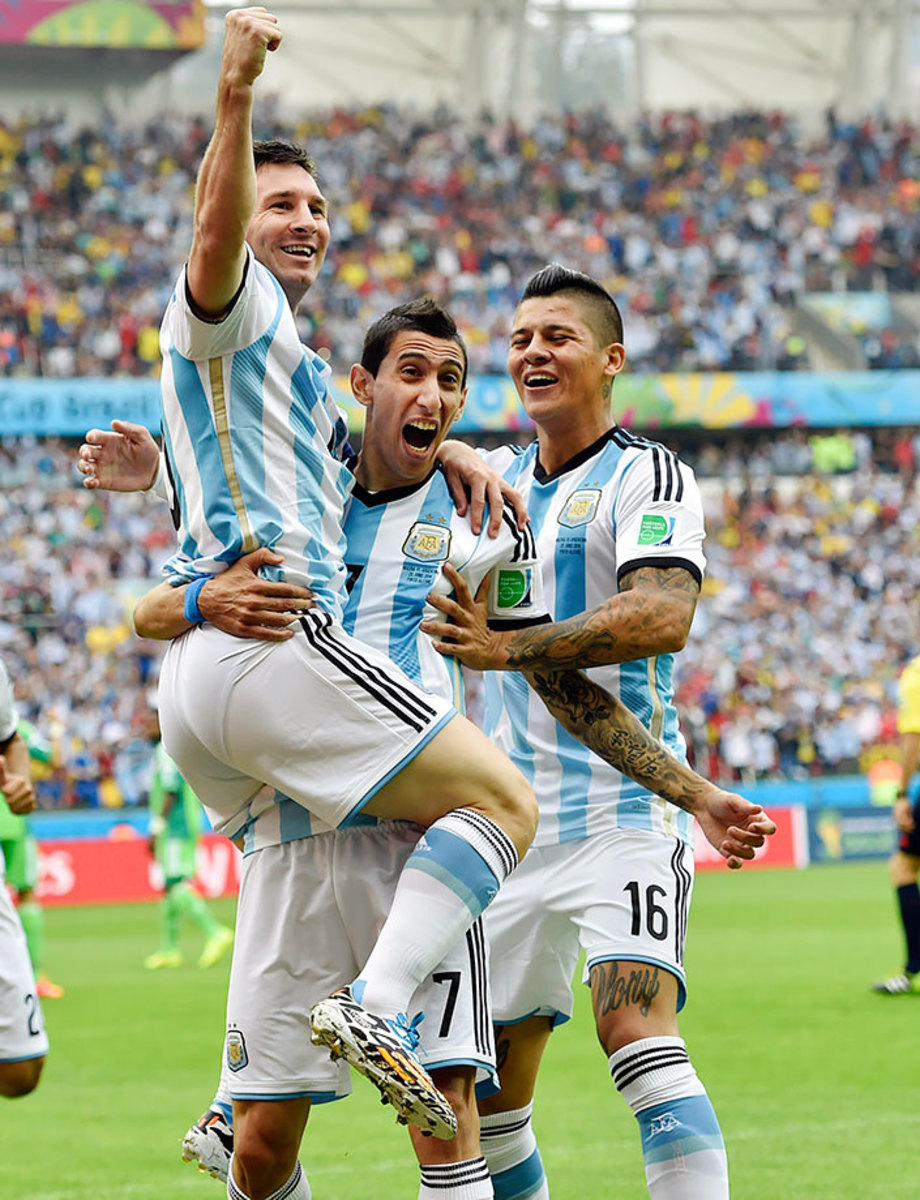 2014-0625-Lionel-Messi-Angel-di-Maria-Marcos-Rojo.jpg