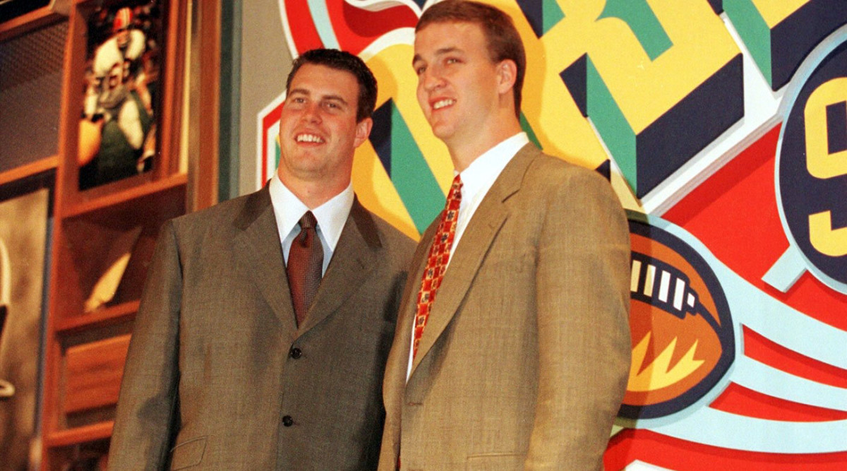 As the 1998 NFL draft approached, it became clear that Leaf (left) and Peyton Manning’s NFL careers would always be linked together.