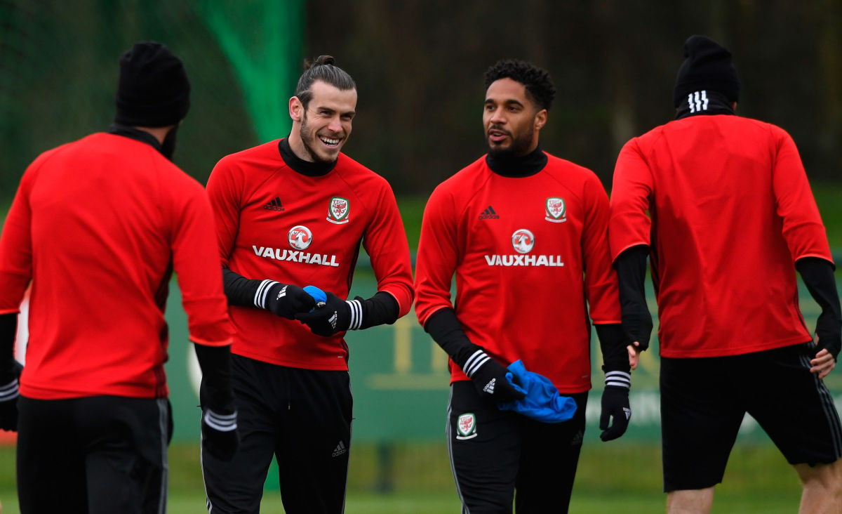 CARDIFF, WALES - MARCH 23:  Wales player Gareth Bale (2nd l) shares a joke with captain Ashley Williams during a Wales Open Training session ahead of their World Cup Qualifier against the Republic of Ireland at the Vale Hotel on March 23, 2017 in Cardiff, Wales.  (Photo by Stu Forster/Getty Images)