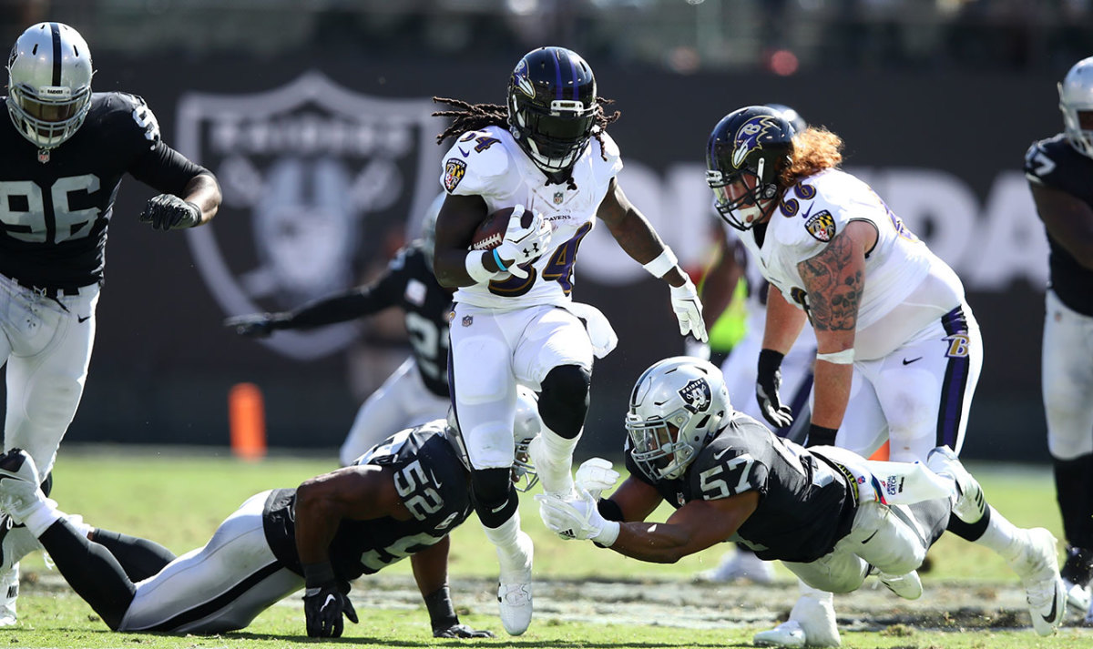 Alex Collins shows off his dance-inspired footwork.