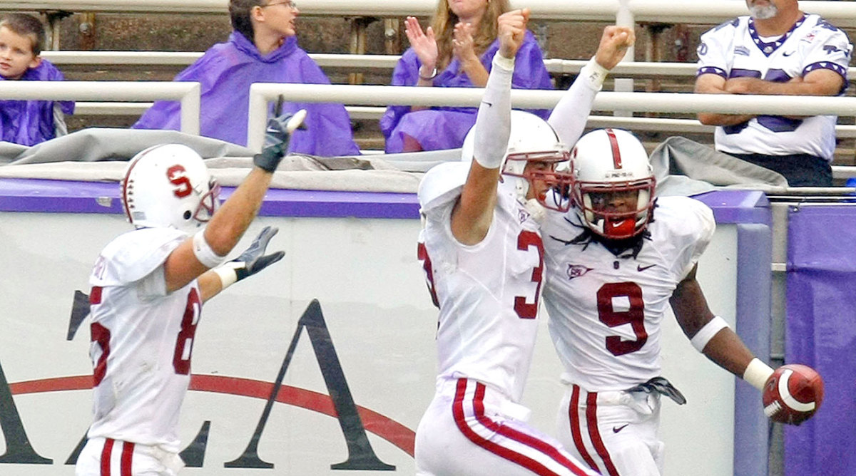 Richard Sherman (right) celebrates scoring a TD on a blocked punt against TCU with Mark Mueller (center) and Nate Wilcox-Fogel (left).