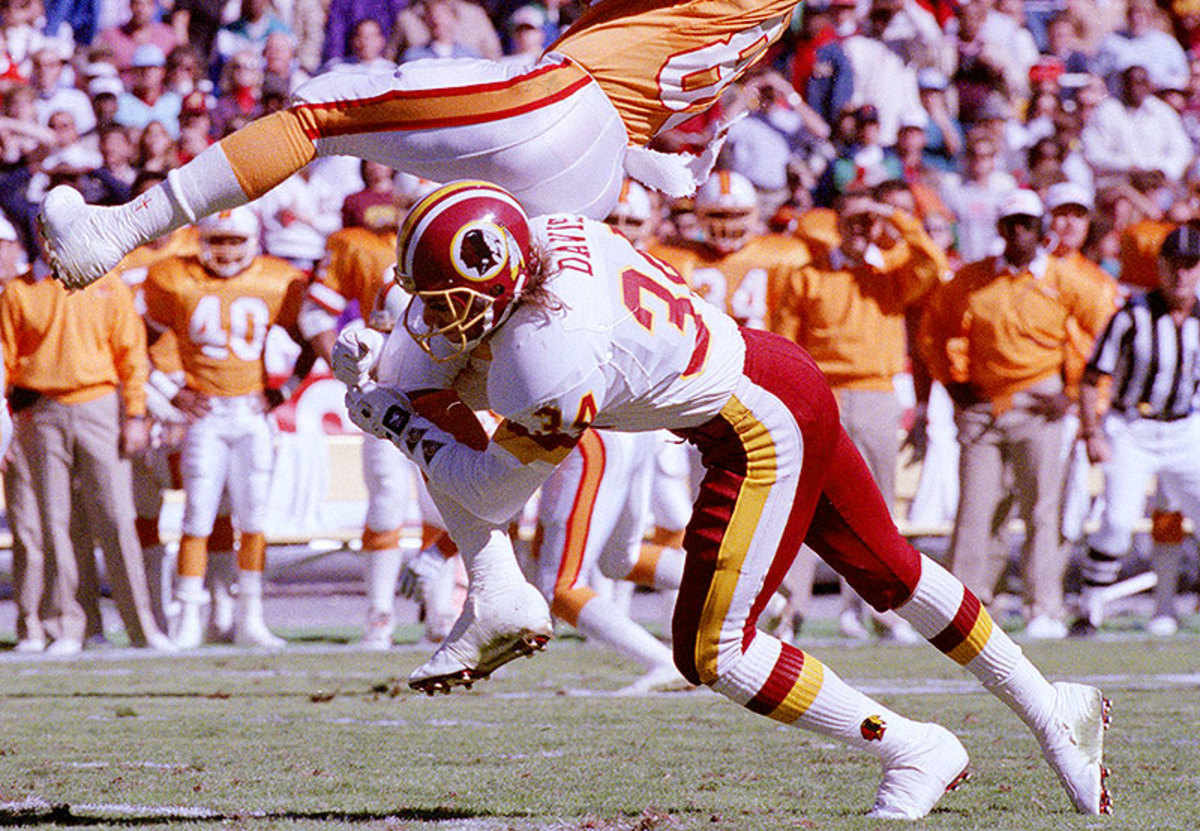 Redskins CB Brian Davis upends Buccaneers WR Mark Carrier.