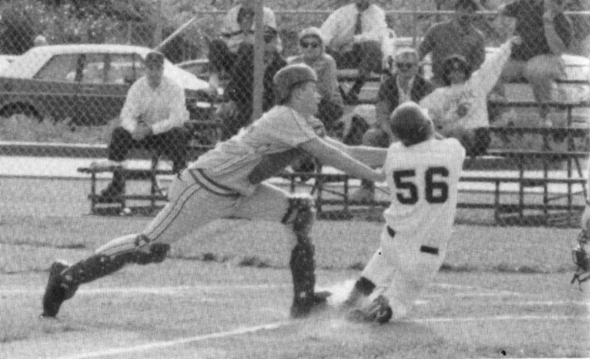 As a JV catcher in 1993, Brady applies the tag at home.