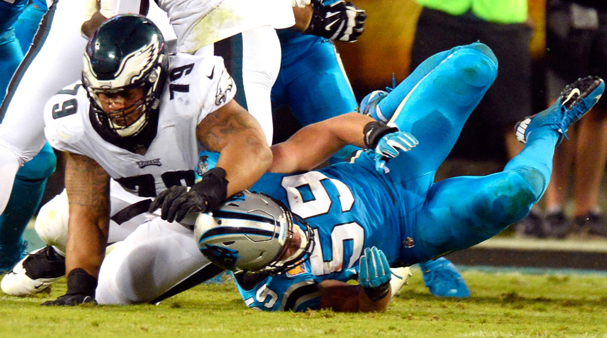 The aftermath of the collision between Brandon Brooks and Luke Kuechly that forced the latter from the game.