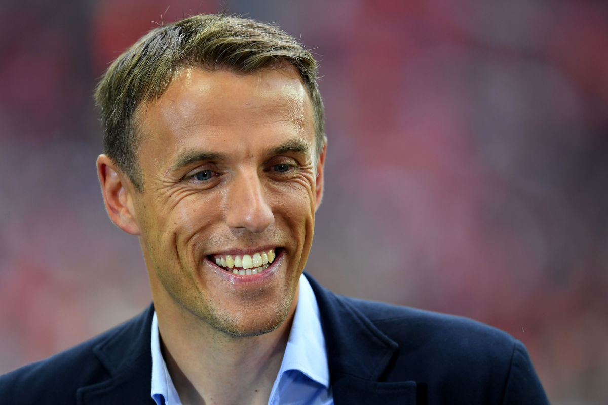 LONDON, ENGLAND - MAY 21:  Pundit Phil Neville smiles prior to The Emirates FA Cup Final match between Manchester United and Crystal Palace at Wembley Stadium on May 21, 2016 in London, England.  (Photo by Mike Hewitt/Getty Images)