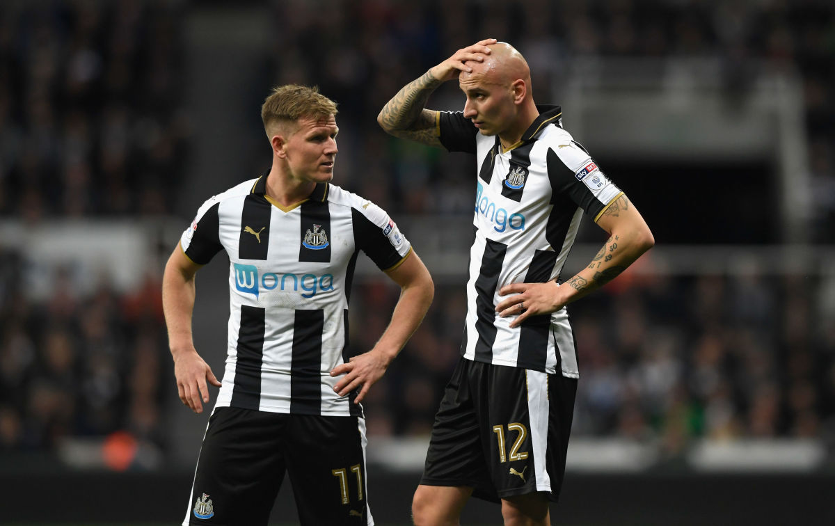 NEWCASTLE UPON TYNE, ENGLAND - APRIL 14:  Matt Ritchie (l) and Jonjo Shelvey of Newcastle react during the Sky Bet Championship match between Newcastle United and Leeds United at St James' Park on April 14, 2017 in Newcastle upon Tyne, England.  (Photo by Stu Forster/Getty Images)