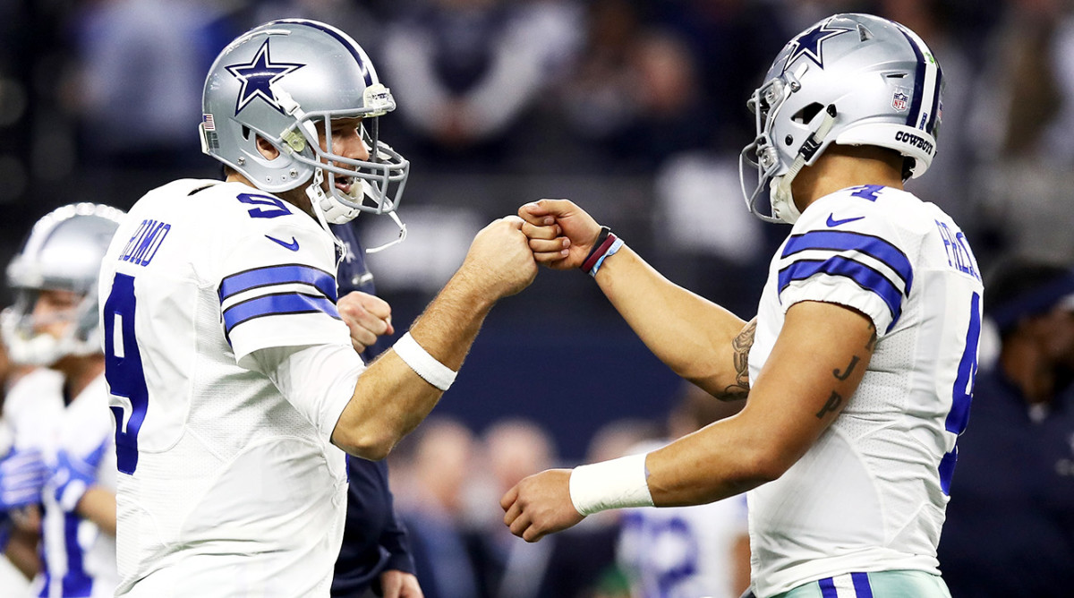 Romo (left) and Prescott during warmups before January's divisional playoff game against the Packers, Romo's last game as an NFL player.