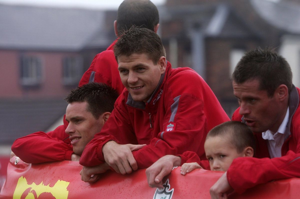 LIVERPOOL, UNITED KINGDOM - MAY 14:  (L-R) Steve Finnan, Steven Gerrard, Jamie Carragher and his son Jamie during the Liverpool Football Club FA Cup Trophy Parade on May 14, 2006 in Liverpool, England.  (Photo by Michael Steele/Getty Images)