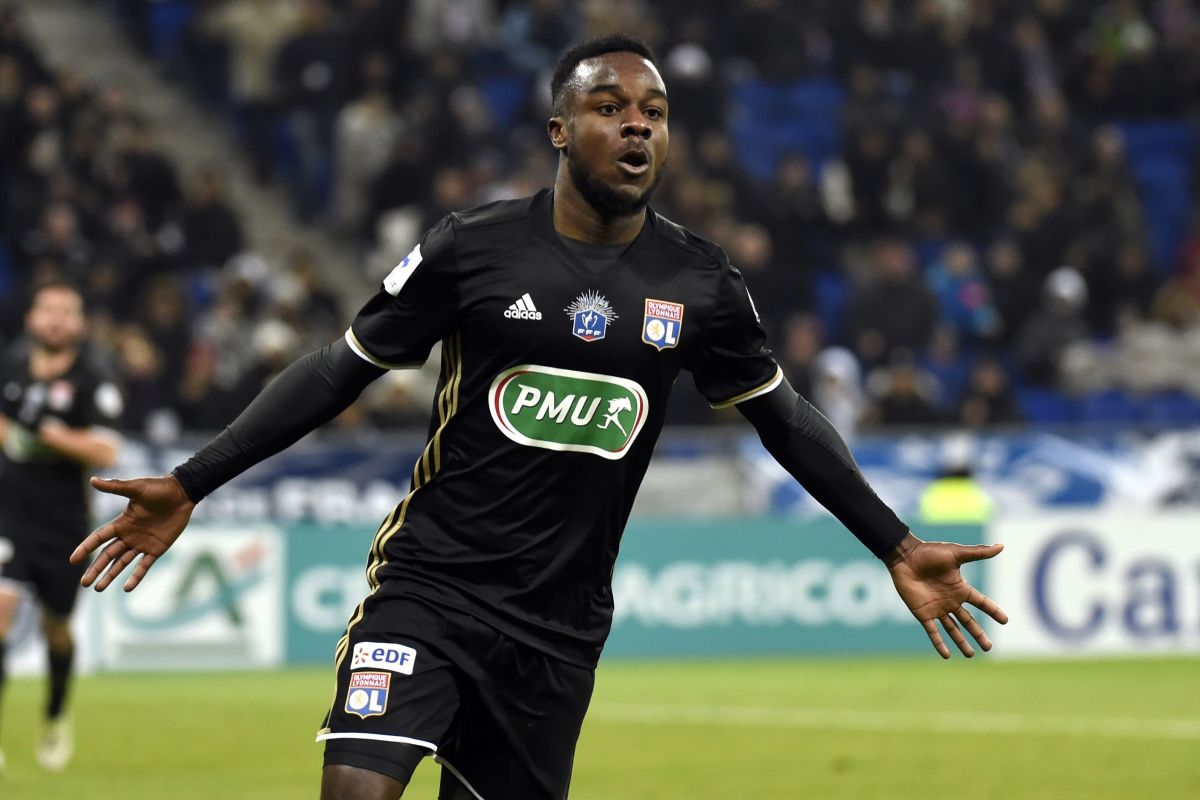 Lyon's French forward Maxwel Cornet celebrates after scoring during the French Cup football match between Olympique Lyonnais and Montpellier on January 8, 2017, at the Parc Olympique Lyonnais, nicknamed the Grand Stade in Lyon, eastern France. / AFP / PHILIPPE DESMAZES        (Photo credit should read PHILIPPE DESMAZES/AFP/Getty Images)