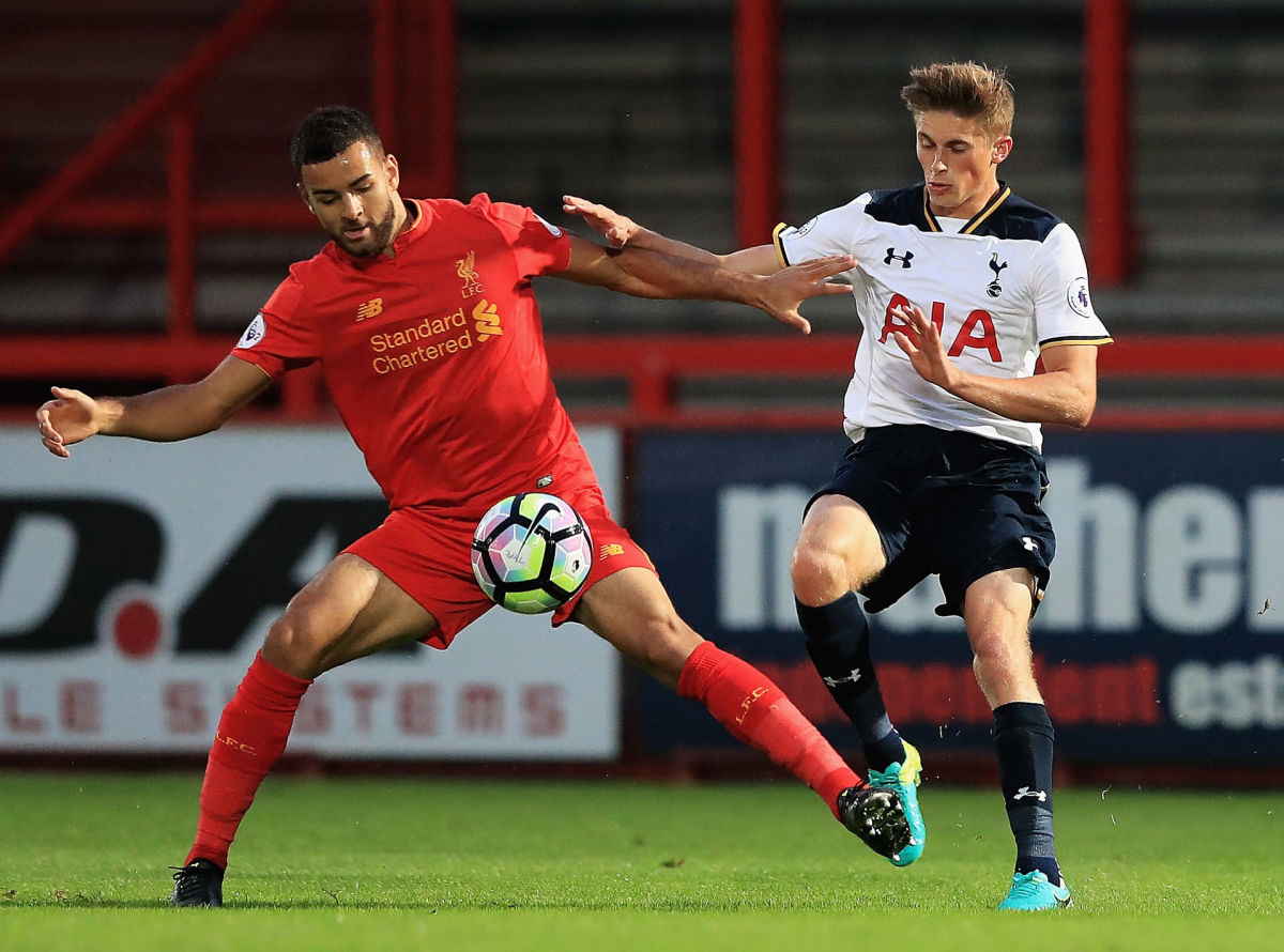 STEVENAGE, ENGLAND - SEPTEMBER 19:  Kevin Stewart of Liverpool holds off Joe Pritchard of Tottenham during the Premier League 2 match between Tottenham Hotspur and Liverpool at The Lamex Stadium on September 19, 2016 in Stevenage, England.  (Photo by Matthew Lewis/Getty Images)