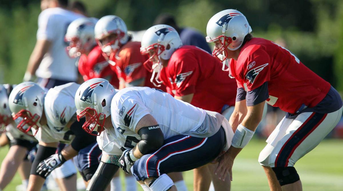 Tom Brady practicing snaps with center Dan Koppen.